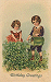 Boy and girl watering clover?