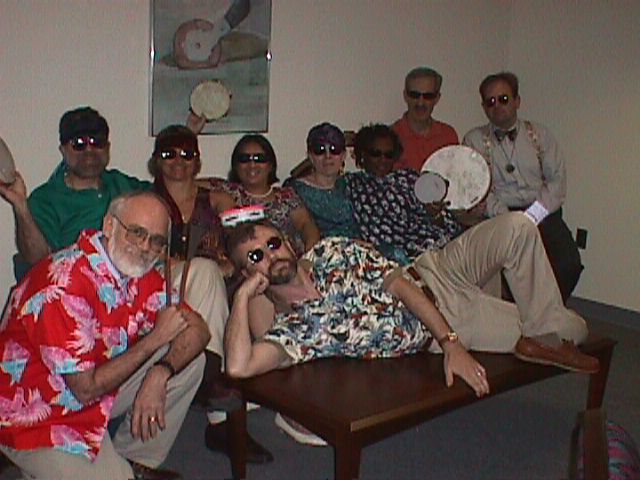 band members in sunglasses and Hawaiian shirts