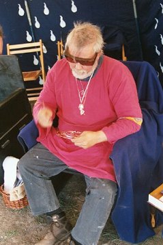 Baron Rudolf von der Drau filing the rete on his astrolabe