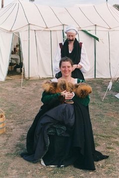 Aelesia braids Mistress Nicolette Dufay's hair