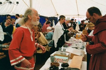 Master Thorfinn selling to Lord Giles of Leabrook, with Mistress nicolette Dufay & Aelesia de Trachdene merchanting precious stones in the background