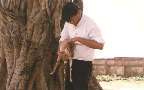 Bonku at Bakreshwar holding a goat