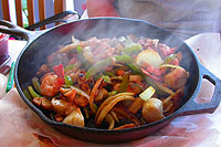 Sizzling fajitas Captiva style with fresh ahi, grouper, shrimp, scallops and more