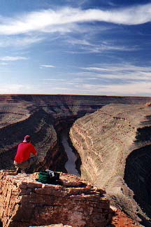 Perched high on the canyon wall above the San Juan River shooting in Goosenecks State Park, Utah