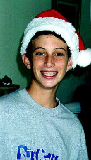 Sean playing Santa (check de Christmas braces)