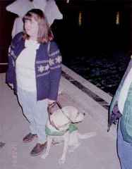Cassie standing with Pele, who is looking over his shoulder
