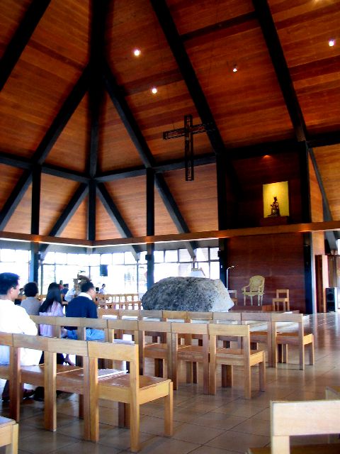 before Sunday mass, church interior with 'boulder' altar