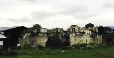 Bricks are formed by the monks in shed on left by centuries old methods.