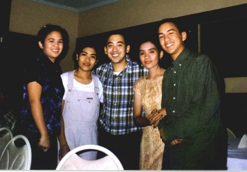 My cousins (Ate) Jen and Michelle with my brother, sister and I.