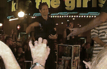 david throws caps at the mob