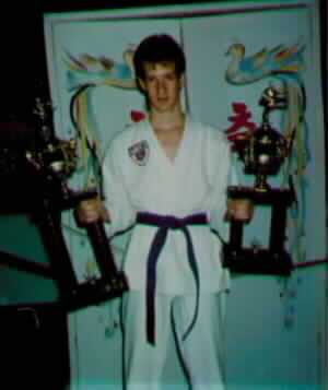 This is me holding my tropheys arent I a true champion? =)