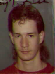 This is an old drivers license picture. This is what I looked like in High School. Like the hair? LOL