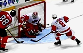 Makes the save on Lindros