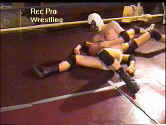 Sur hurts Powers with a tight headlock.