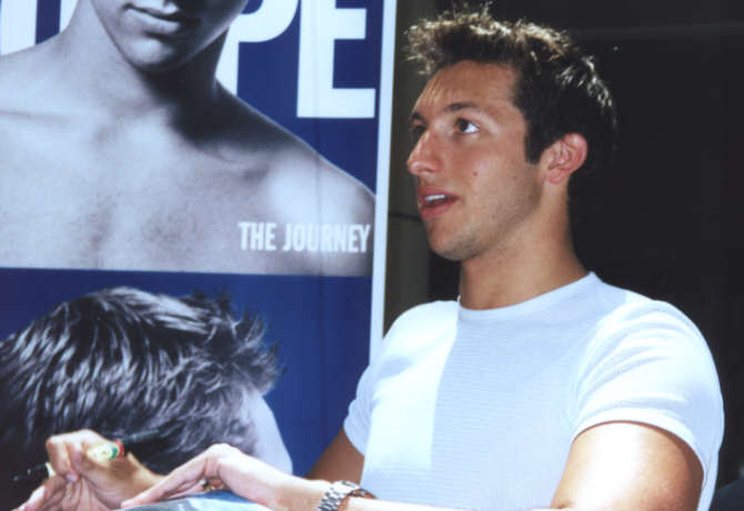 Ian signing book