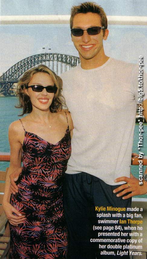 Ian with Kylie Minogue infront of the Sydney Harbour Bridge