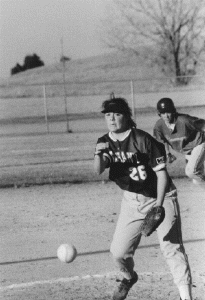 Hurling a pitch toward the plate