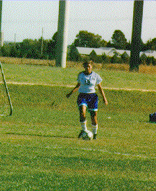 Kirstin Medley kicks to her teammates