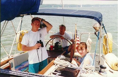 Tim, Karen, and 
		his dad onboard the Serendipity II