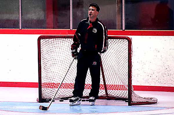 Head Coach Bob Mongrain doing drills with the team