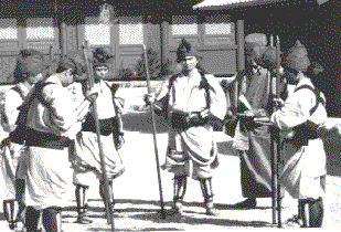 A gathering of Chikudon Pechin in the courtyard of Shuri Castle during Okinawa's old Ryukyu