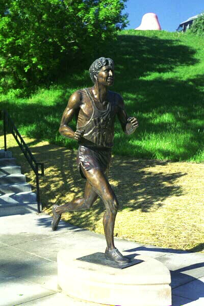 Statue of Frank Shorter at the base of the stadium.
