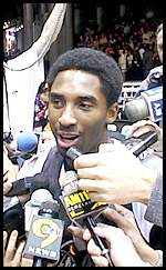 Kobe talking to the press