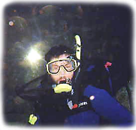 Posing in front of a fish display.