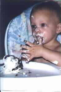 Jodi Eating Her First Birthday Cake