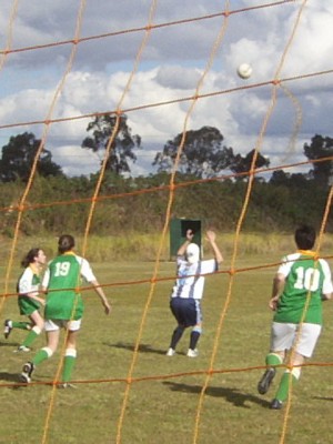 Shamrocks converge on a waiting O'Reillys player in the ladies match