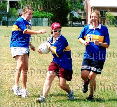 South East Advertiser January 22, 2003: Cathy Orgill, Renae Whitehead and Narelle Saward of Easts Celts training for the Gaelic Football season.