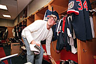 Lowe empties his locker after the 1999 season