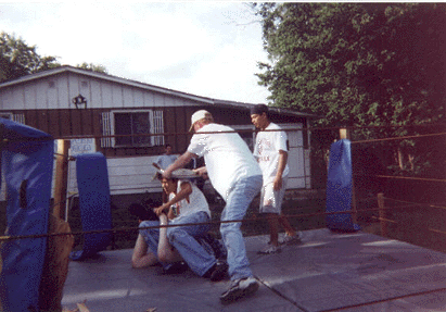 71 Pac Nails The Enforcer Over The Head With A TV Tray While Interfering