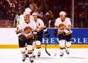 Lumme skating around with Cournall, Bure and ?