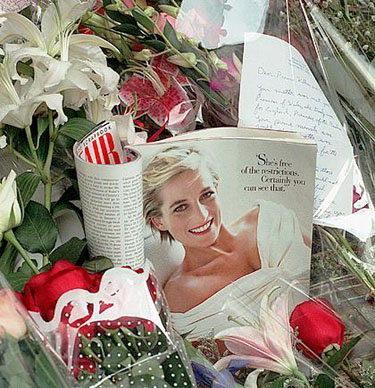 A Vanity Fair on a bed of flowers at Kensington palace. The page features her and the quotation, 'She's free of the restrictions...'