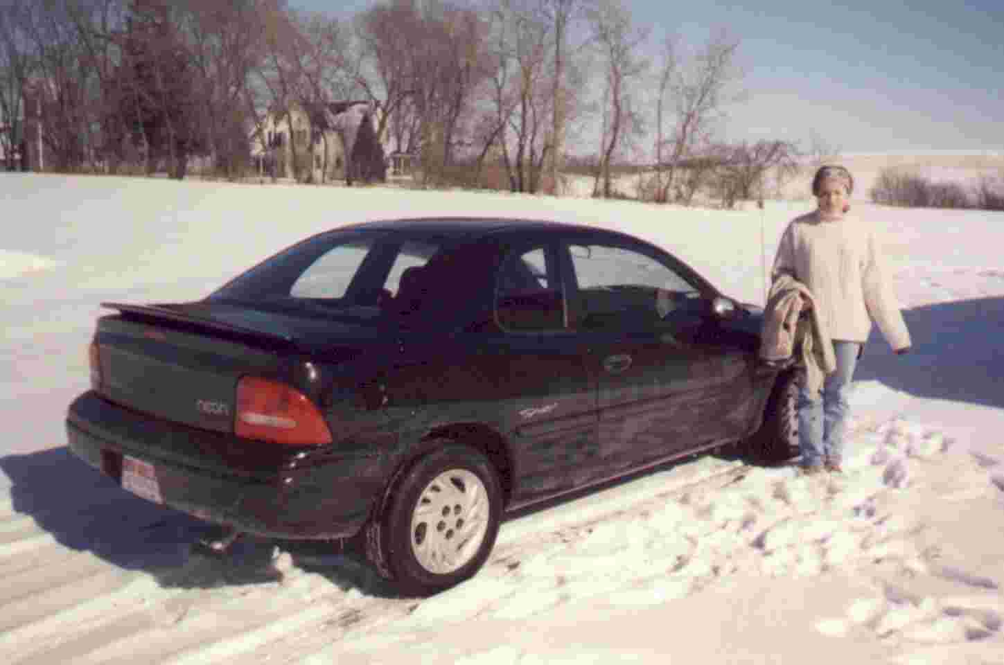 This is my 1997 Dodge Neon and my friend Holly.