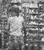 Young factorygirl with Jeans looking back