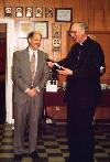 Dr. Howarth Presenting Dr. Pittelko with the beer.