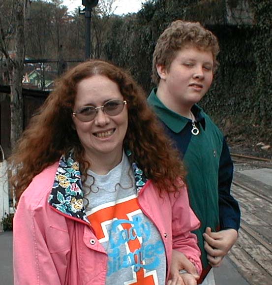 Cathy and Luke, rock band cover-like, on their first 2001 trip to Dollywood, March 31, 2001