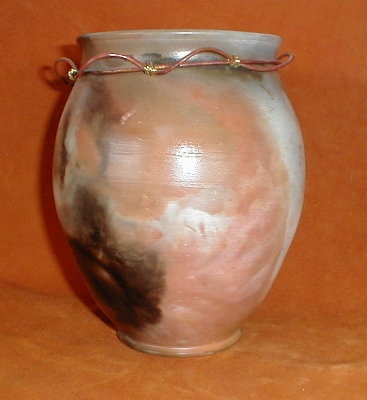 Raku pot with brass and copper trim
