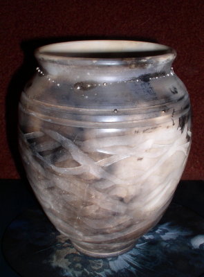 Raku vase with silver beaded rim