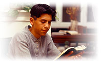 Image of a young man reading