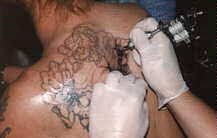 Larry, getting a demon inked in.