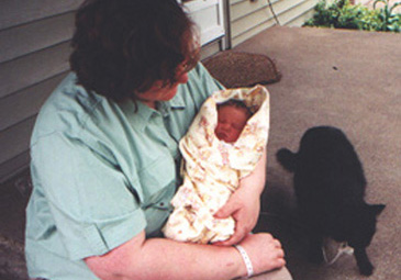 Sarah, Mommy and Reba on the Front Porch