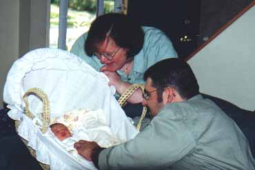 Mommy & Daddy watching Sarah sleep