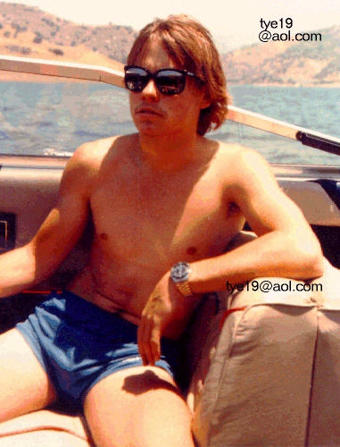 Boy called Tye, aged 19 on boat in blue shorts.