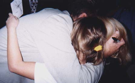 Michael hugging Lacy and Allison