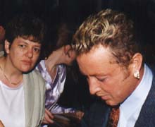 Michael giving autograph