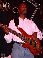Gerald Spencer, bass guitar.
