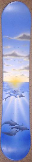 Snowboard with Dolphin and Sunset Design